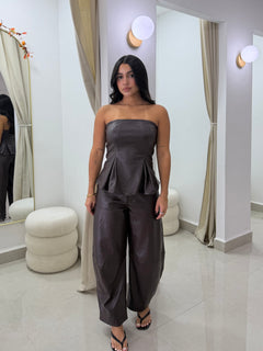 Brown leather strapless top and barrel pants