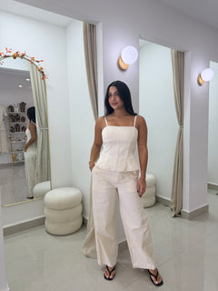 Cream peplum top and barrel pants